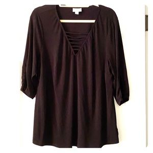 Black top with nice detail at neckline and sleeves